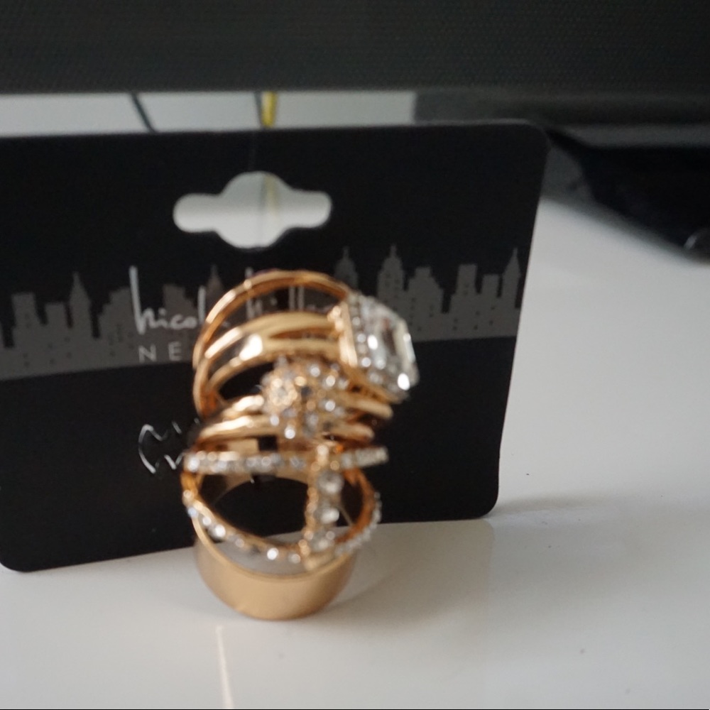 Nicole Miller set of gold rings